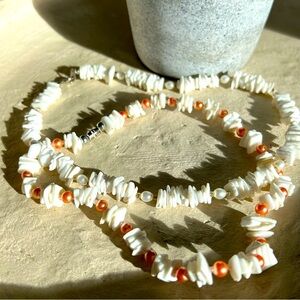 2 white shell necklaces with faux pearls